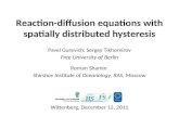 Reaction-diffusion equations with spatially distributed hysteresis